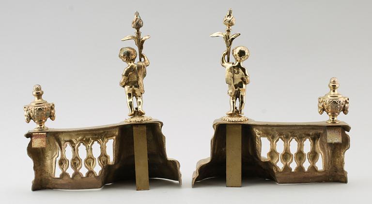 ELDHUNDAR, 1 par, förgylld metall, England, 1900-/2000-tal.