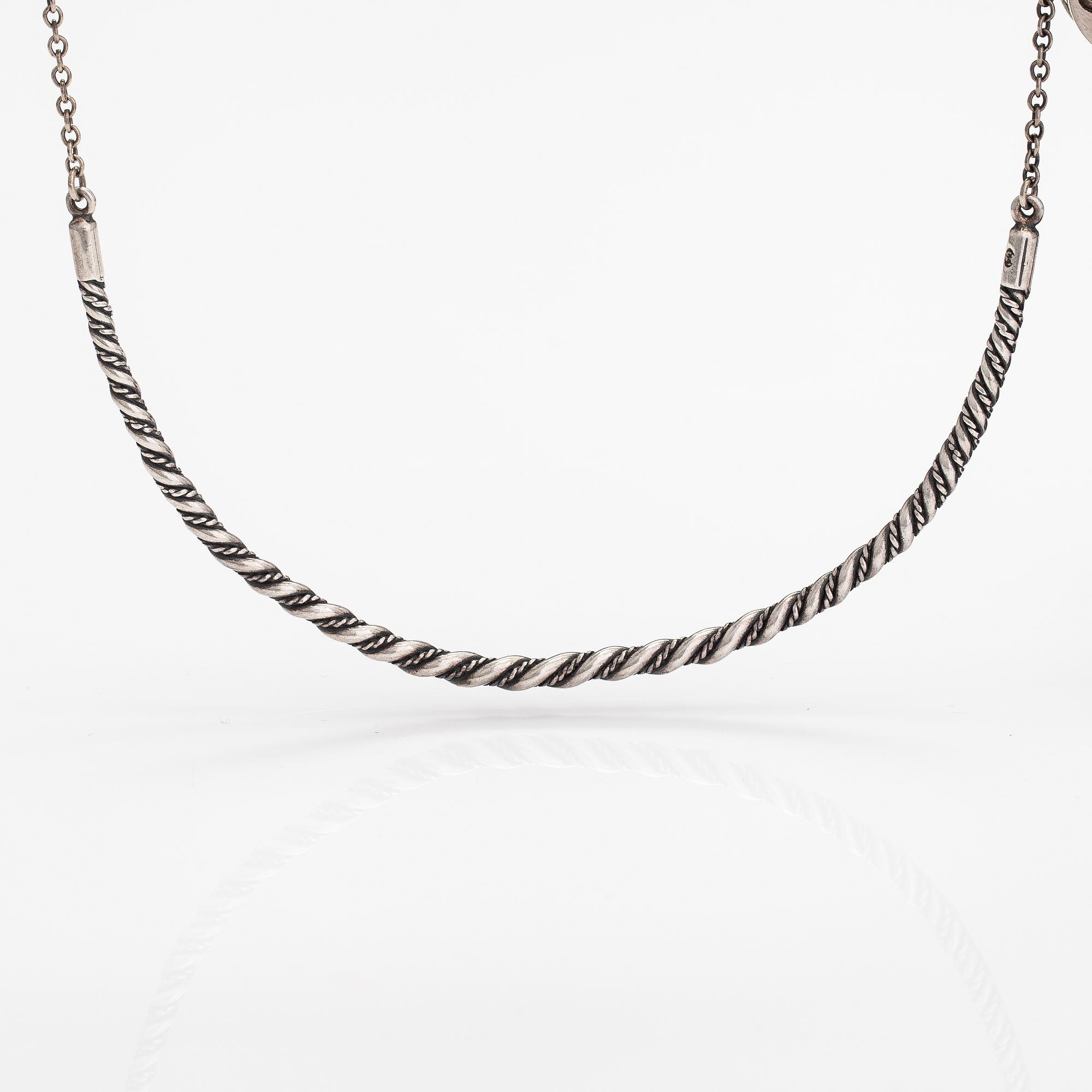 A sterling silver necklace "Twined jewellery from Lampola in Halikko". Kalevala koru, Helsinki 1992.