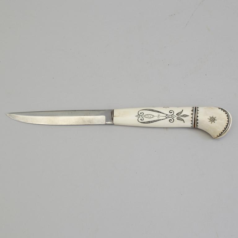 ANTON ENARSSON, a Sami reindeer horn knife, signed AE.