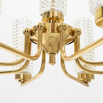 A glass and brass ceiling light, second half of the 20th Century.