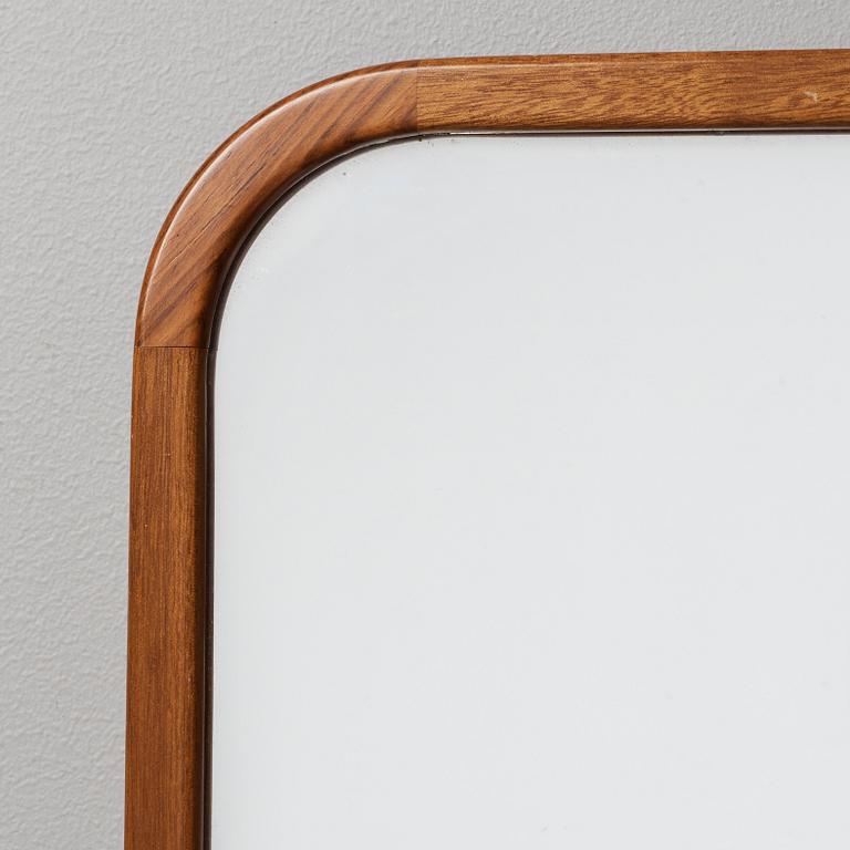 Josef Frank, A Josef Frank mahogany wall mirror, model nr 888, Firma Svenskt Tenn 1950's-60's.