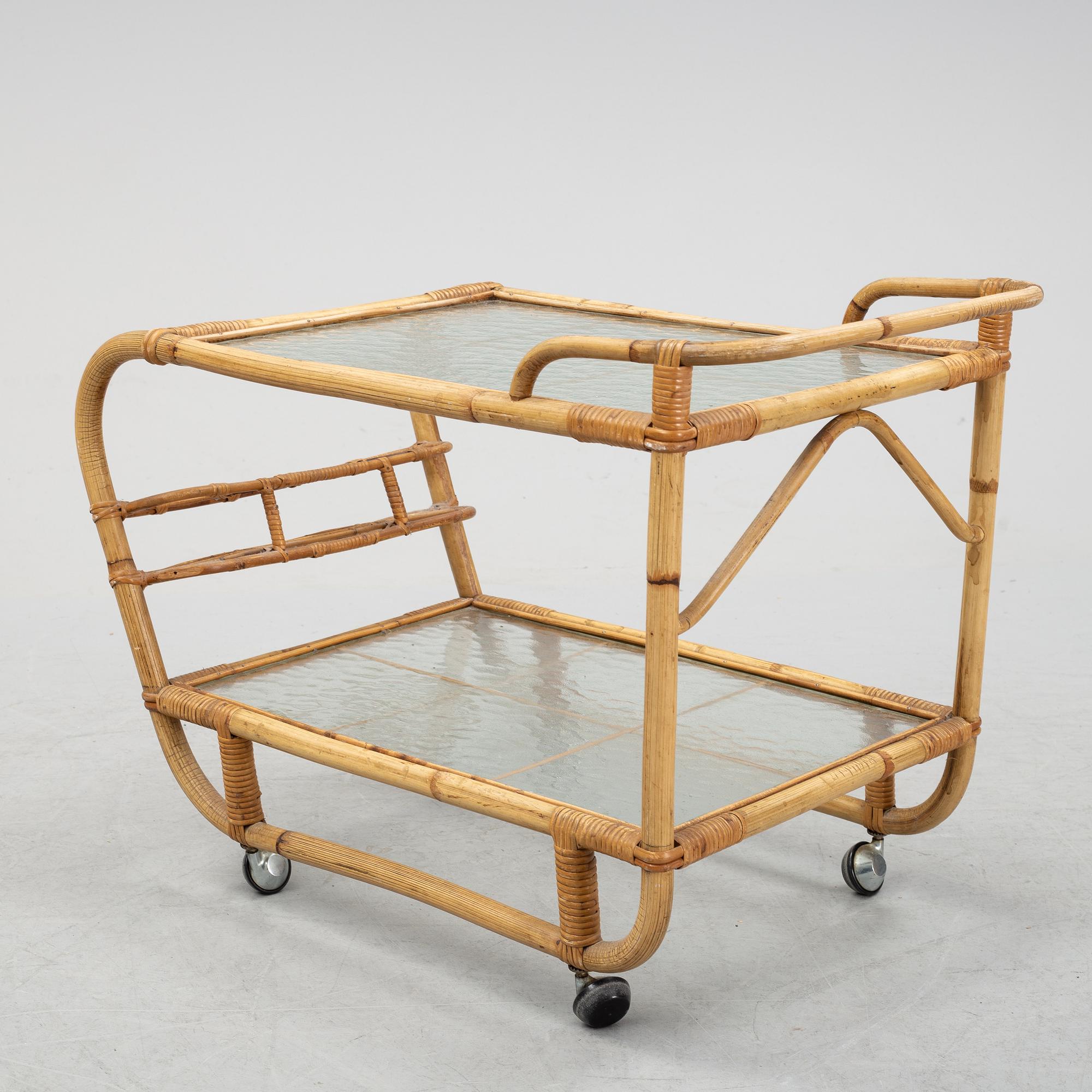 A second half of the 20th century rattan drinks trolley.