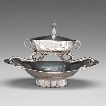 Georg Jensen, a bowl with cover on stand, Copenhagen 1919, design nr 81, 830/1000 silver.