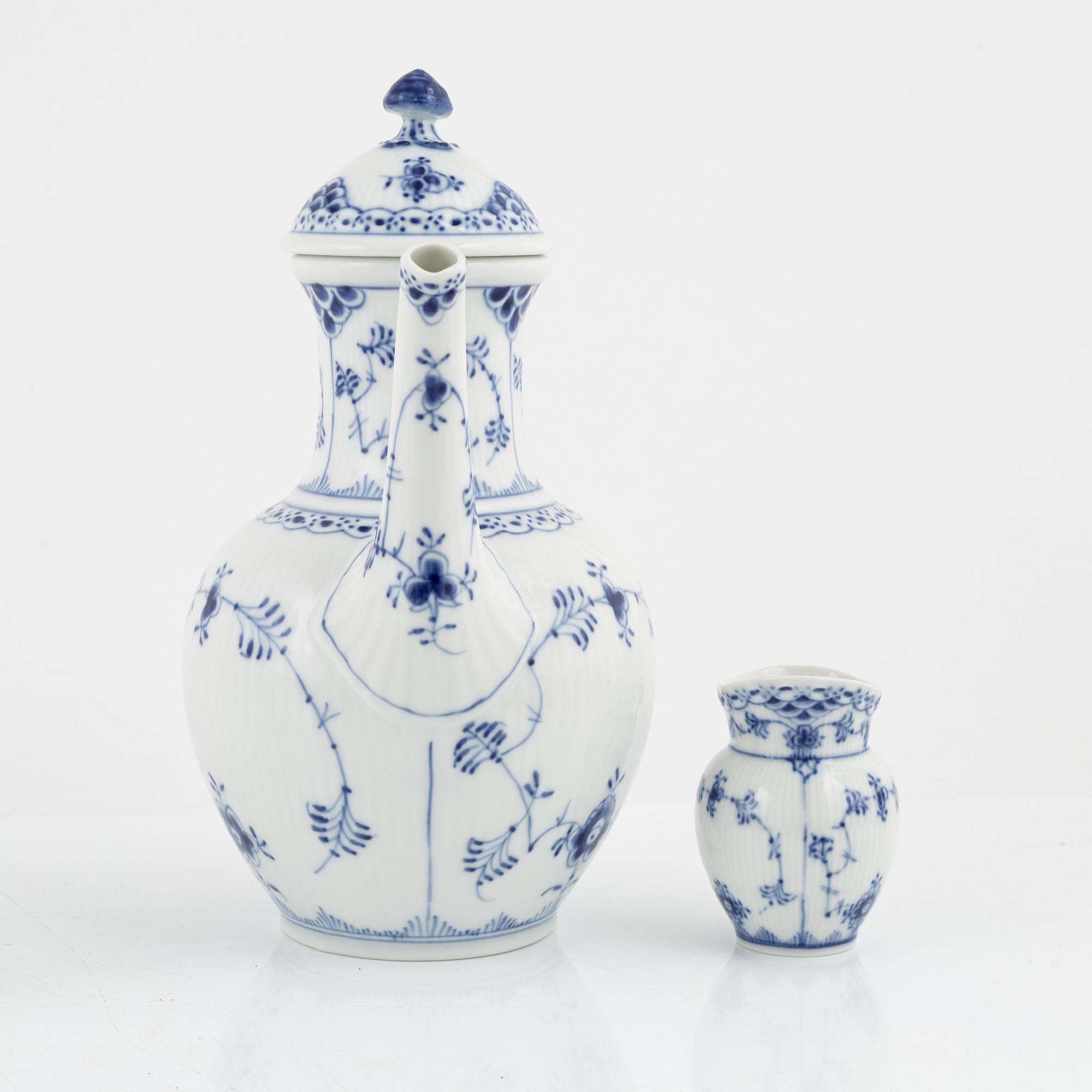 A 26-piece porcelain coffee sevice, half lace 'Musselmalet', Royal Copenhagen, Denmark.