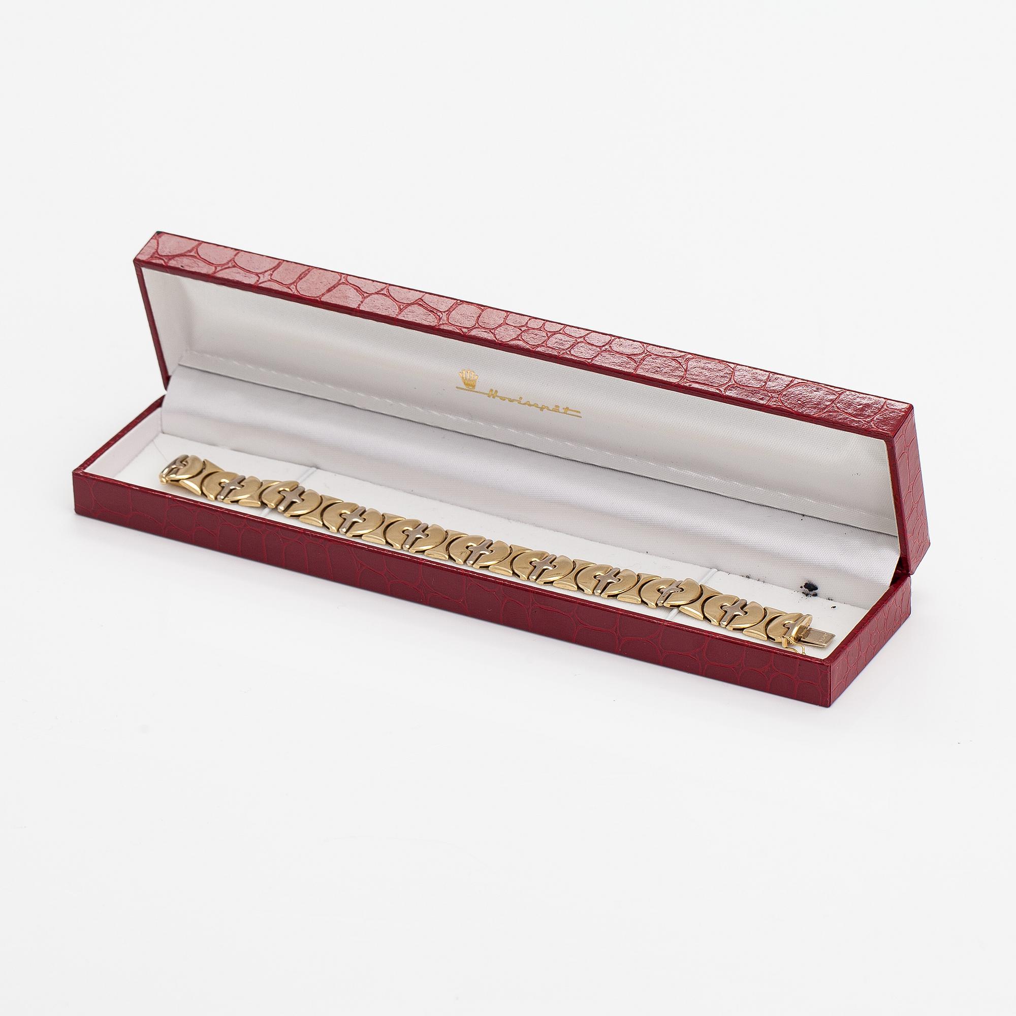 A 14K white and yellow gold bracelet.