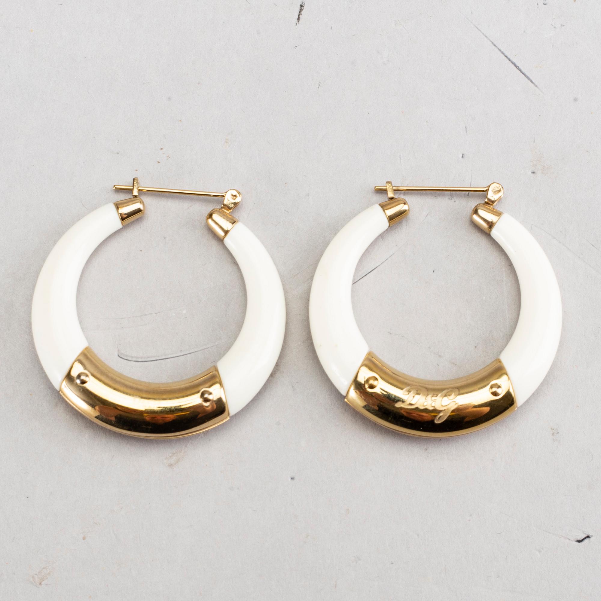 A pair of Dolce & Gabbana earrings.