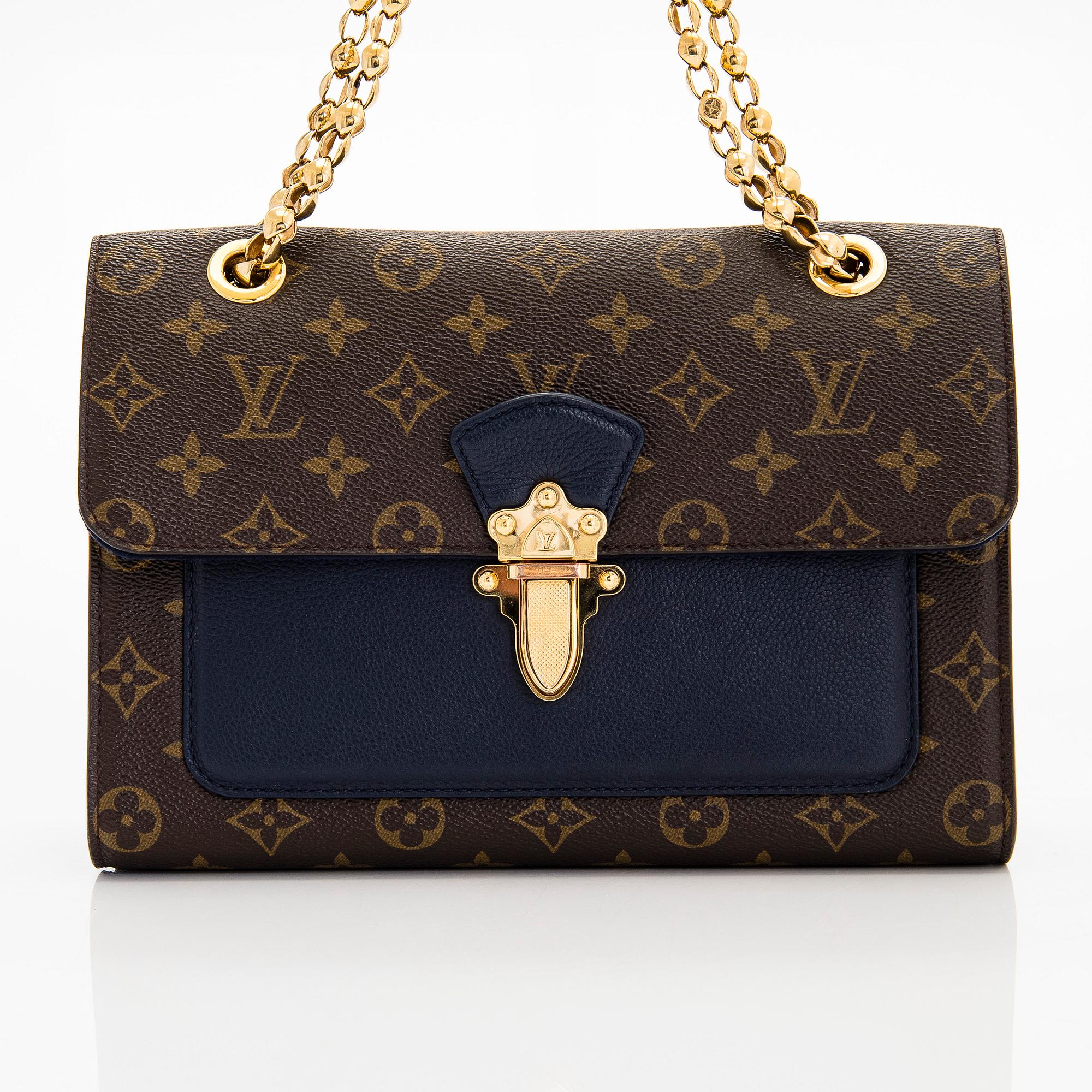 Louis Vuitton, a Monogram 'Victoire' bag.