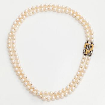 Pearl necklace, clasp 18K gold with diamonds. St Erik's Silverware, Stockholm, 1987.