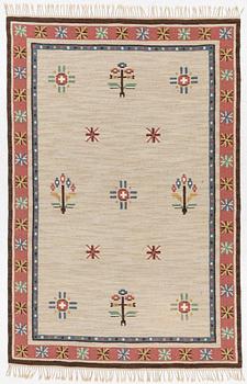 A flat weave carpet, c 304 x 200 cm.