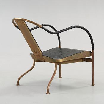 A Mats Theselius 'El Rey' brass and leather easy chair, Källemo, Sweden.