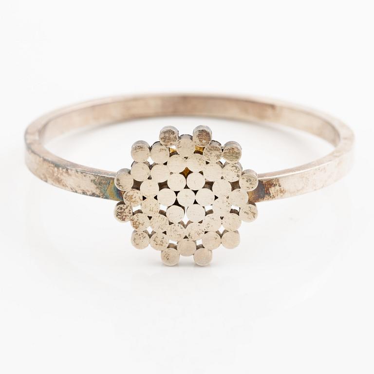 Cecilia Johansson, a bracelet, a ring, and a pair of earrings, silver, Gothenburg 1964 and 1965.