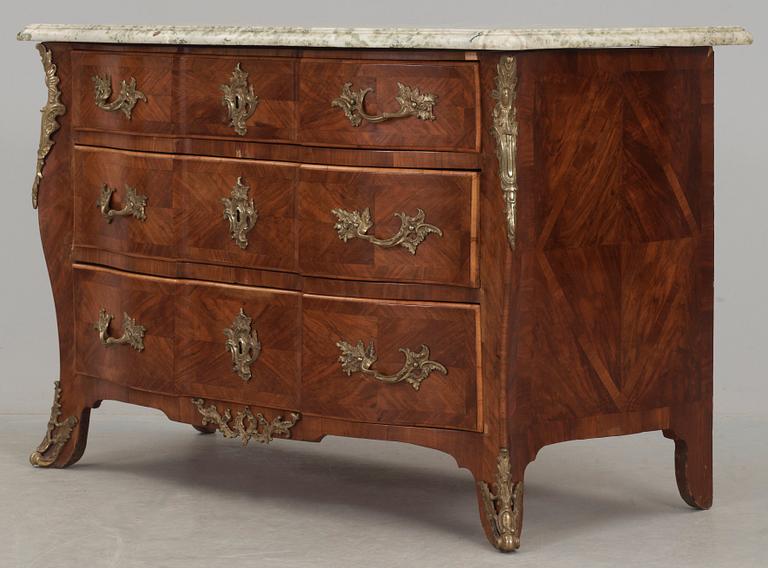 A Swedish early Rococo mid 18th century commode attributed to Olof Martin, master 1736-1764.