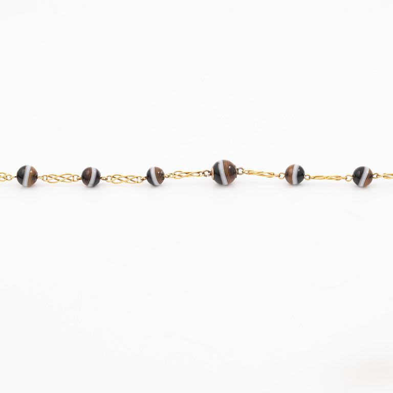 Necklace, 14K gold with banded agates.