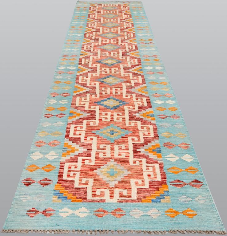 A kilim runner, ca 492 x 100 cm.