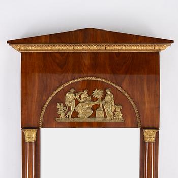 An Empire mirror and console table, first half of the 19th century.