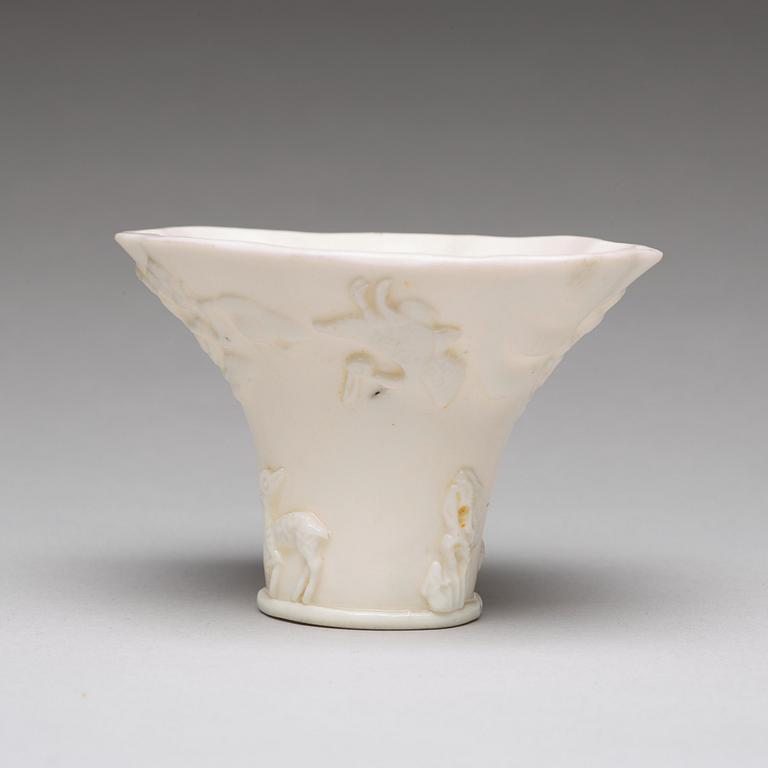 A blanc de chine rhinoserous libation cup Qing dynasty, Kangxi (1662-1722).