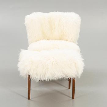 Armchair and footstool, 1950s-1960s.