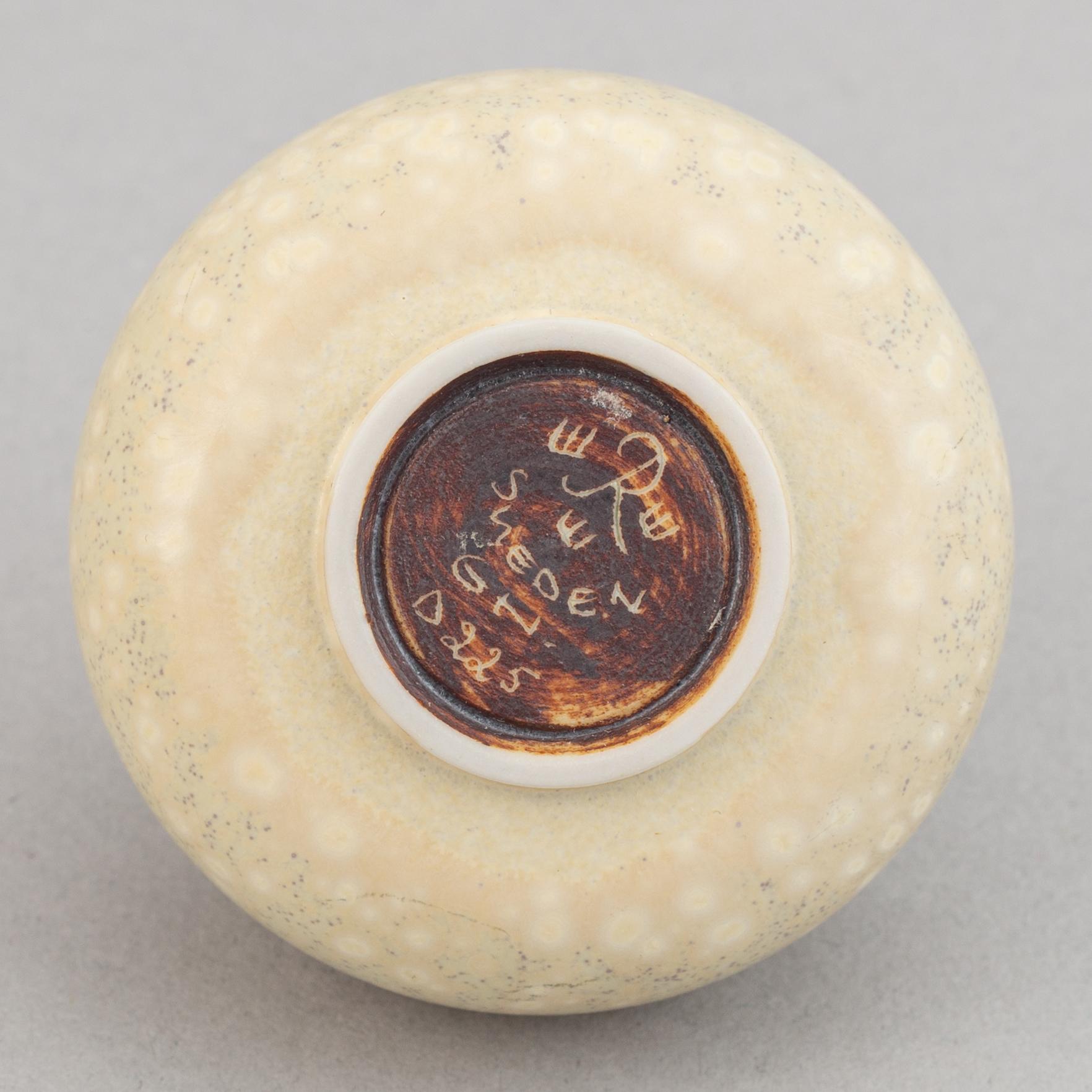 Gunnar Nylund, a set of six stoneware bowls, two miniature vases and a vase for Rörstrand.