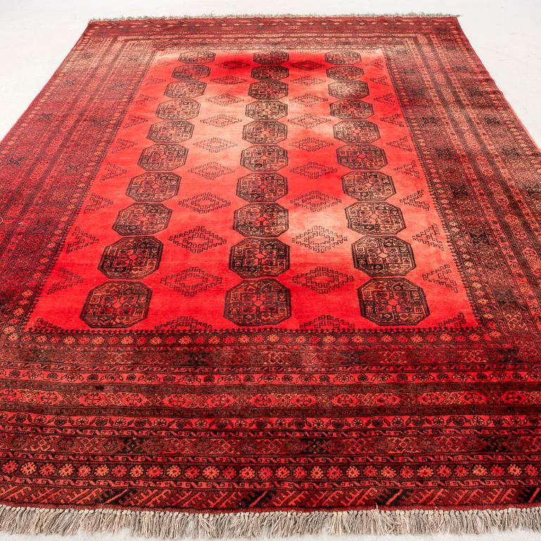 A semaintique Afghan carpet ca 390x300 cm.