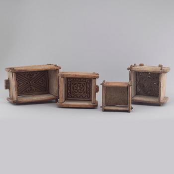 Four handcrafted wooden tins, 19th century.