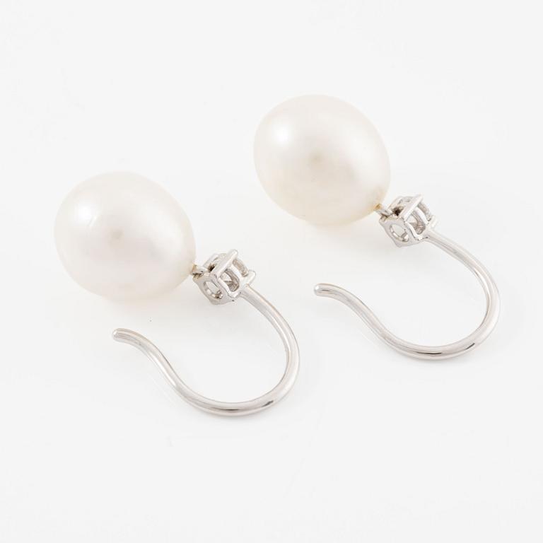 Earrings, 18K white gold with oval cultured pearls and brilliant-cut diamonds.
