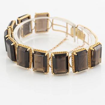 Bracelet, 14K gold with smoky quartz.