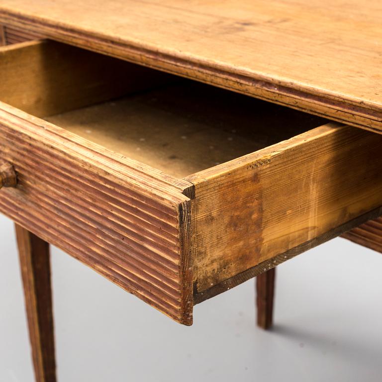 a painted wooden table from the first half of the 19th century.