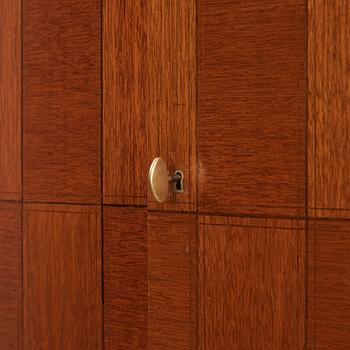 David Rosén, a mahogany and teak cabinet, for Stockholm's Association of Crafts, signed and dated 1959.