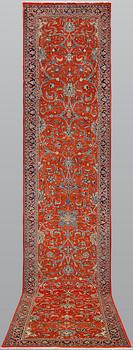 A Sarouk runner, 410 x 80 cm.