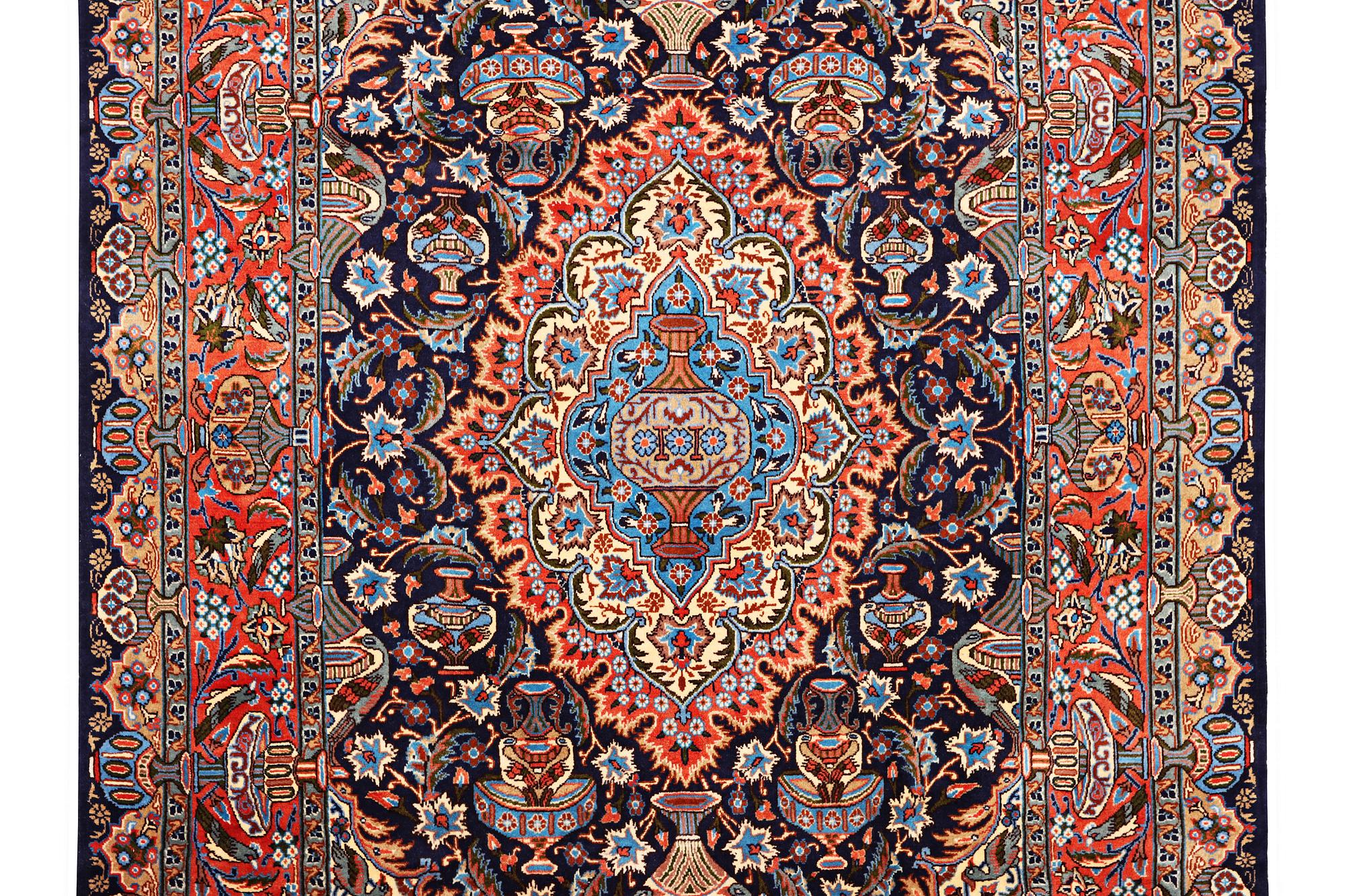 A Kashmar carpet, c. 310 x 203 cm.
