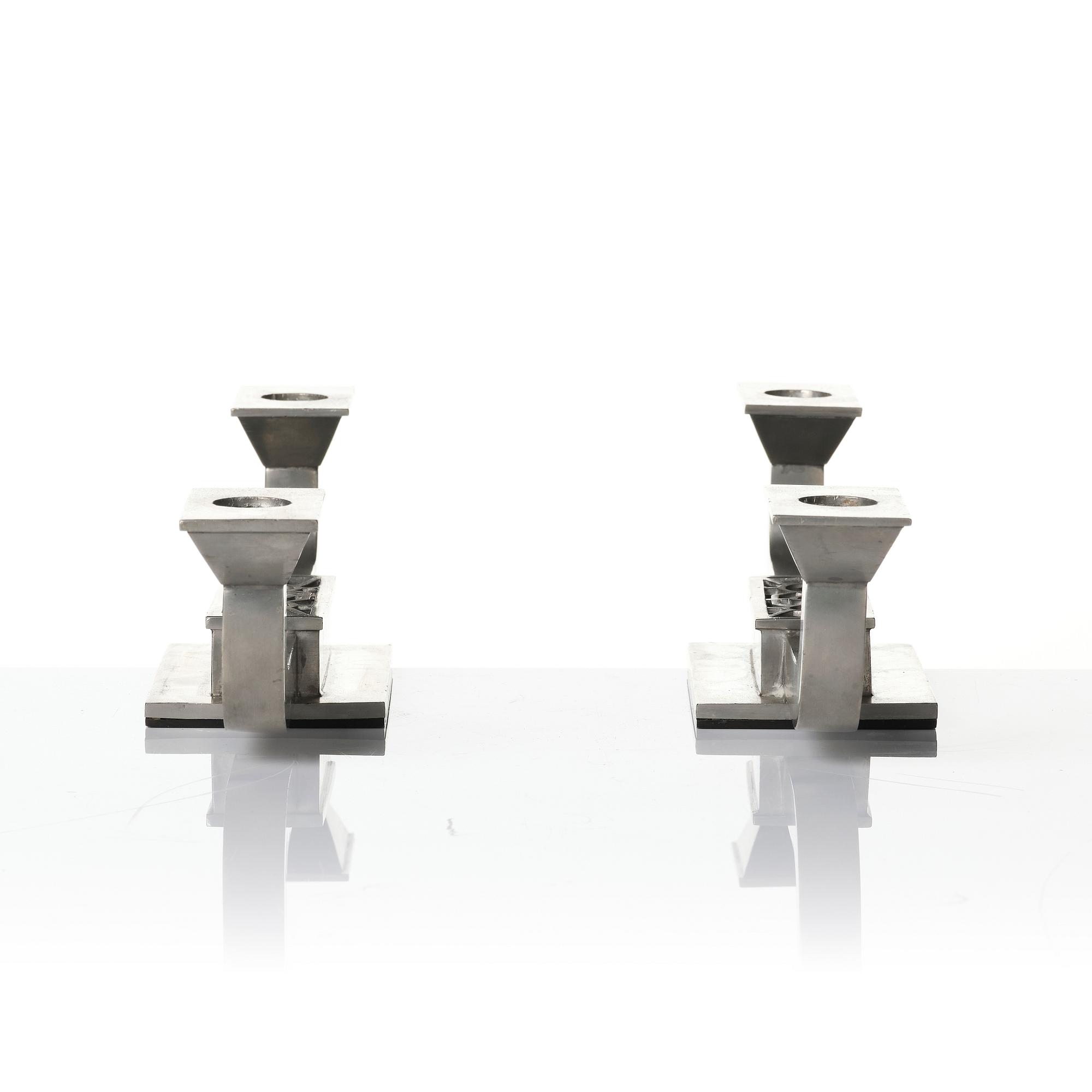 Guldsmedsaktiebolaget (GAB), a pair of candelabra model 117B/1, Stockholm, 1930s.