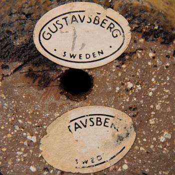 A stoneware figurine, with manufacturer's stamp, Gustavsberg.