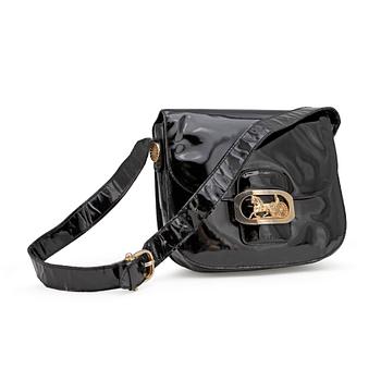 CÉLINE, a black patent leather shoulder bag.