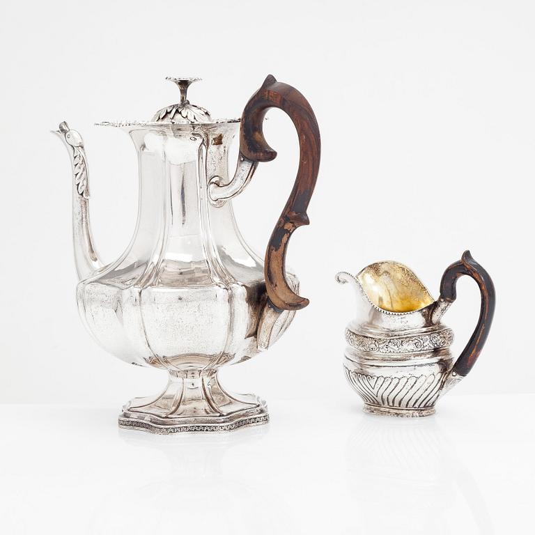 A silver coffee pot, and silver cream jug, Olof Robert Lundgren, Turku 1847 and Fredrik Strömsten, Helsinki 1839.