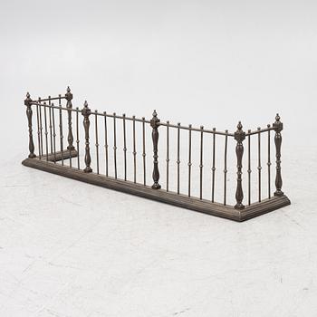 An English brass fire gate, circa 1800.