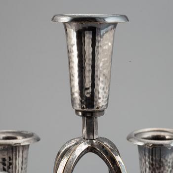 A silver plated candelabrum, early 20th Century.
