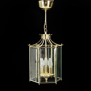 A 20th century brass hexagon hall ceiling lantern for three lights.