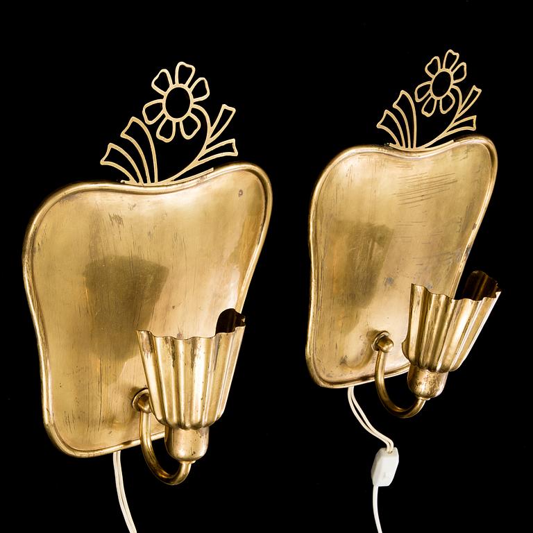 A pair of brass wall-lights by Firma Lars Holström, Arvika.