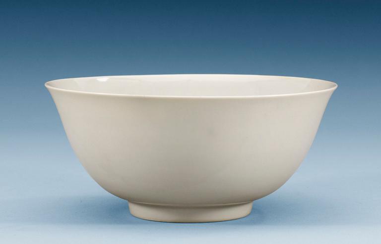 A white glazed bowl with Hongzhis six character mark and period (1488-1505).