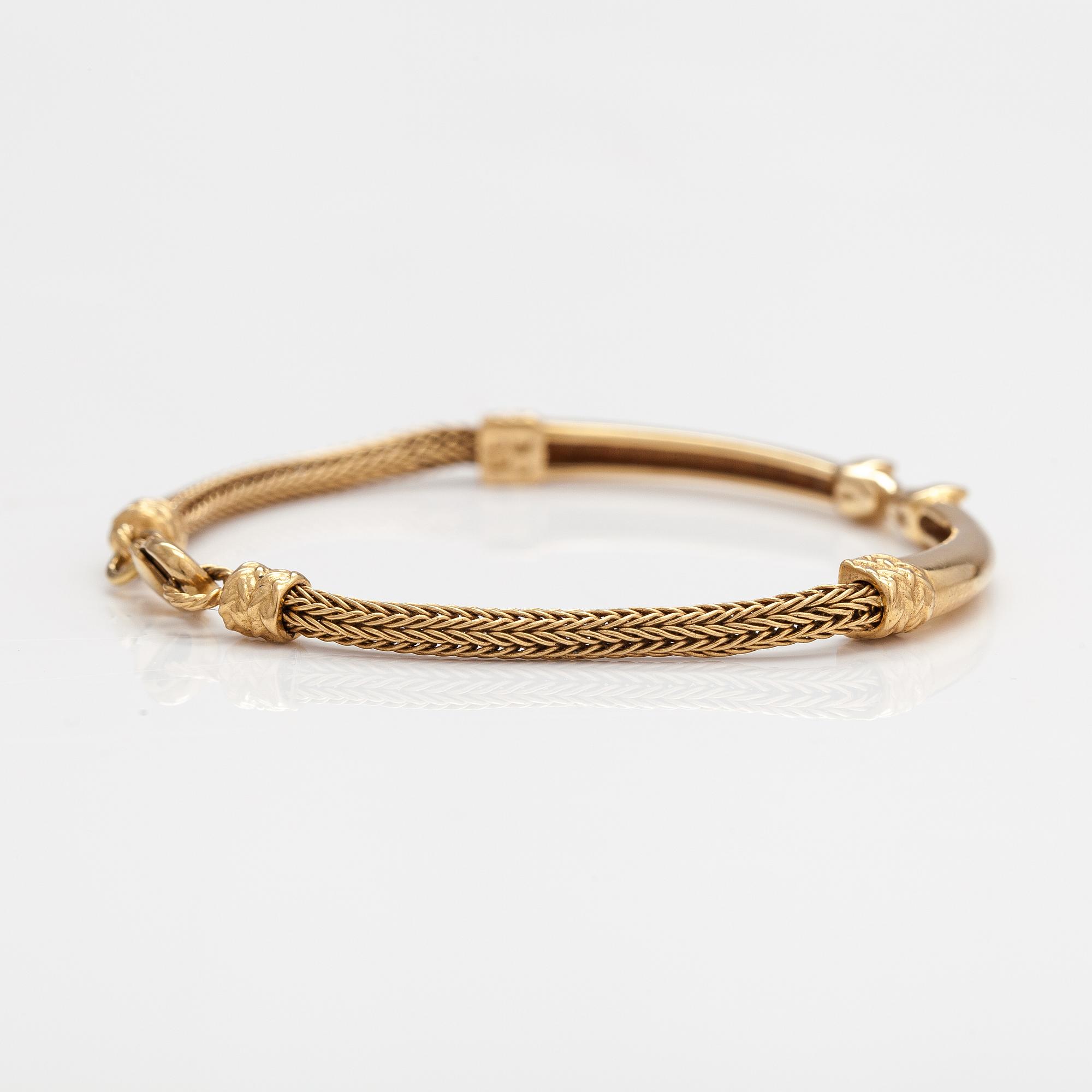 An 18K gold bracelet "Moose head". Kalevala Koru, Helsinki 1999.