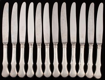 A SET OF RUSSIAN CUTLERY, 12+12+11.