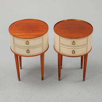 A pair of mid 20th century bedside tables.