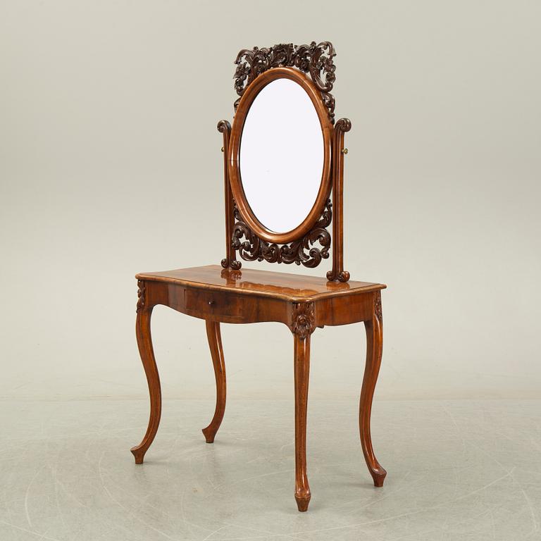 A rococo style dressing table, 19th Century.