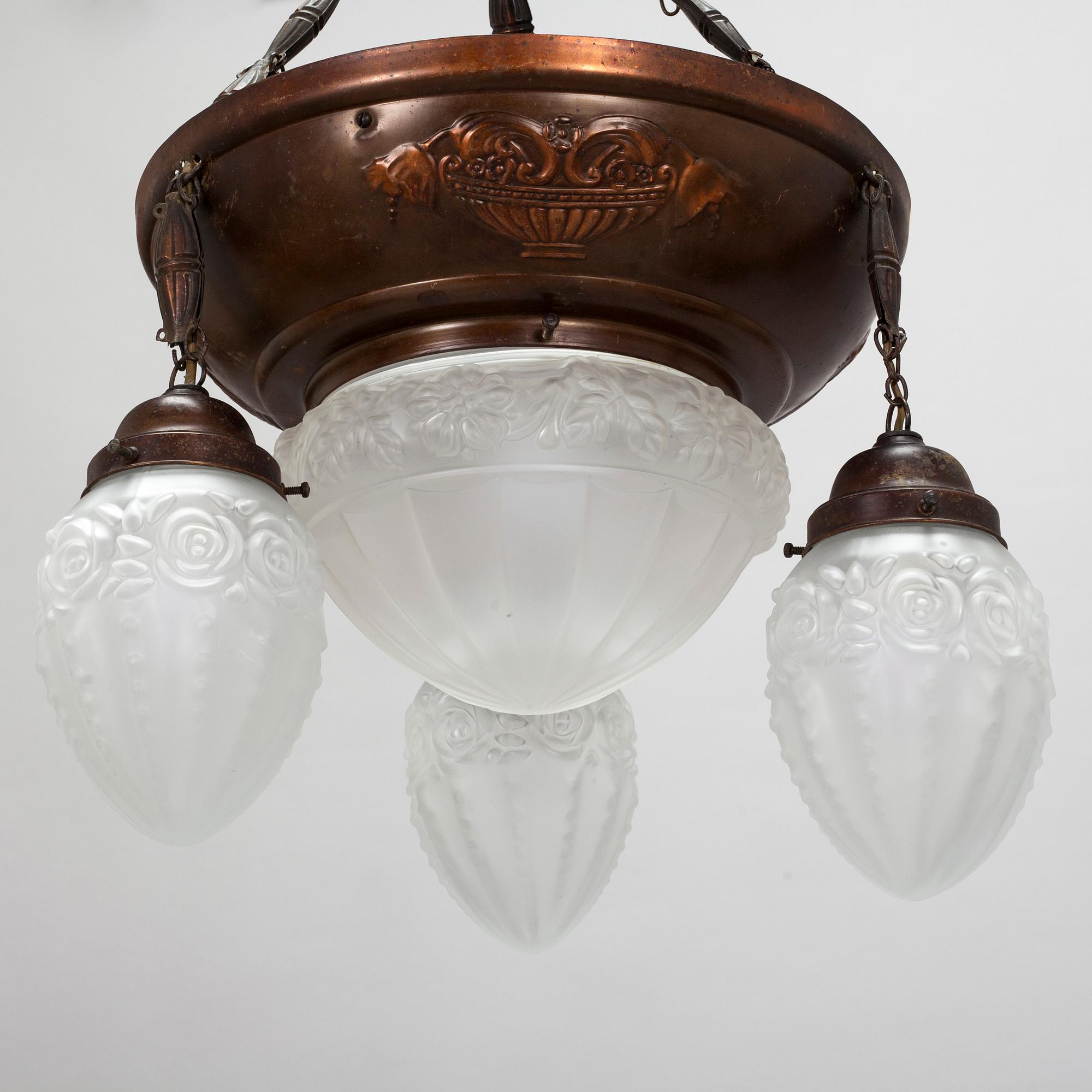 An Art Nouveau ceiling lamp, early 20th century.