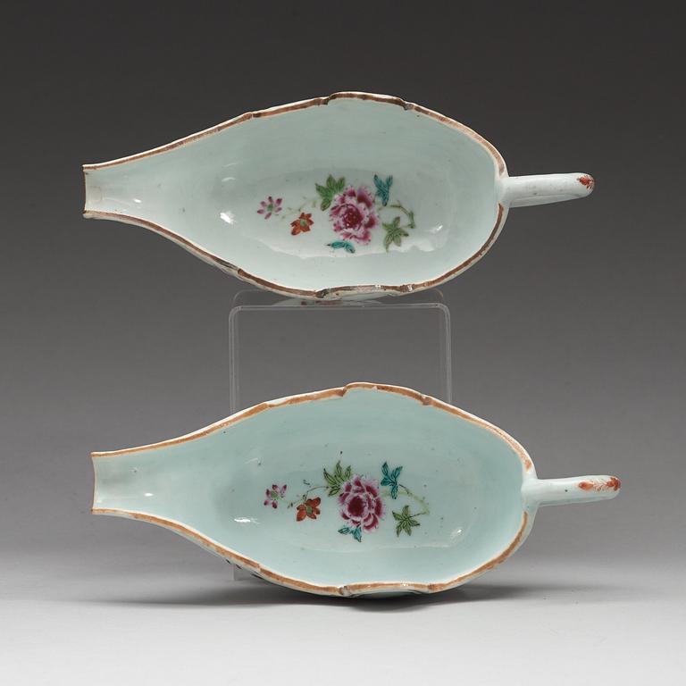 A pair of famille rose 'double peacock' sauce boats, Qing dynasty, Qianlong (1736-95).