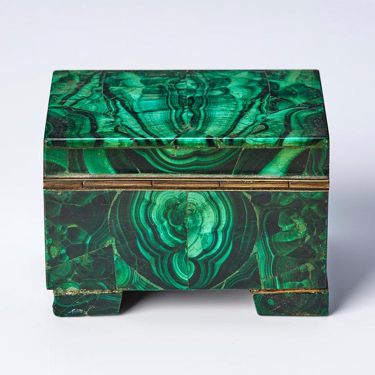 A Russian Nicolas II malachite-veneered box, circa 1900.