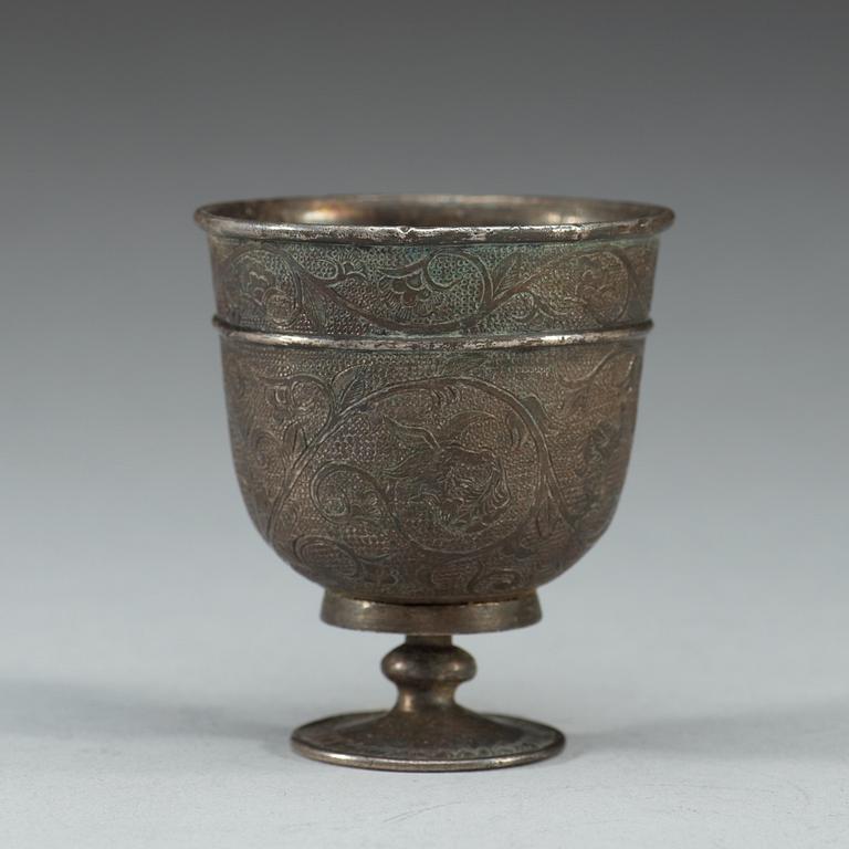 A silver stemcup, presumably Tang dynasty.