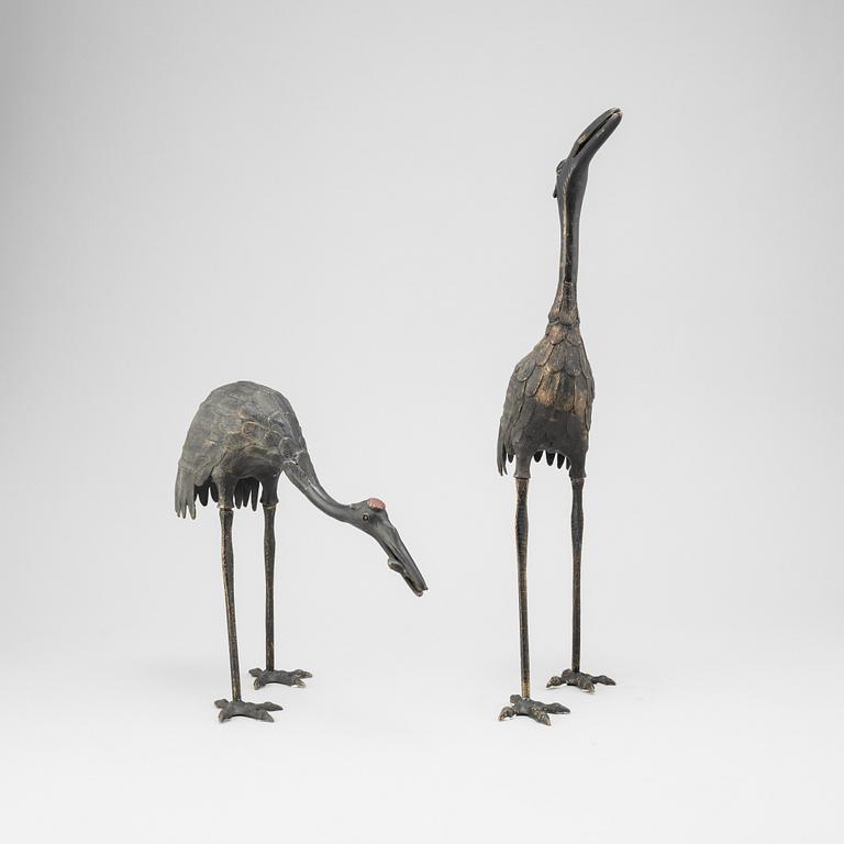 A pair of Chinese metal cranes, first half of the 20th century.