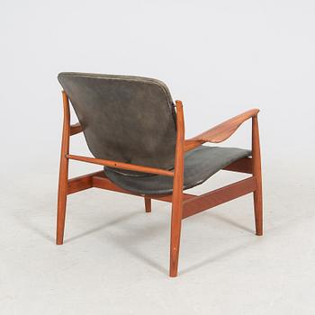 Finn Juhl, a teak armchair model nr 136 France & son Denmark.