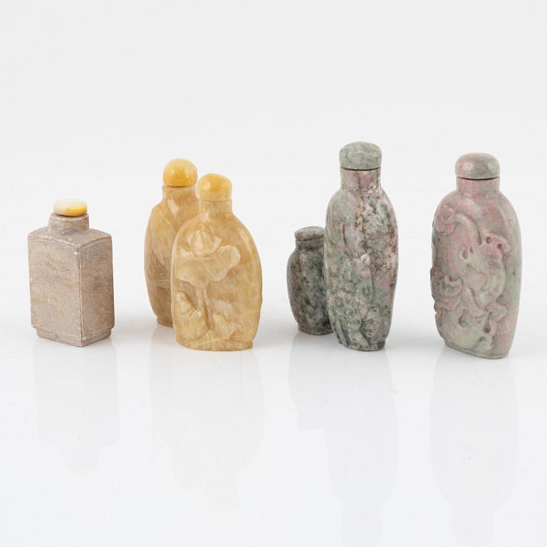 Eight snuff bottles, mottled stone, China, 20th century.